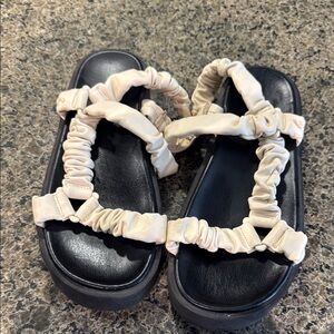 Circus by Sam Edelman Cream and Black Sandals with Ruffle Detail